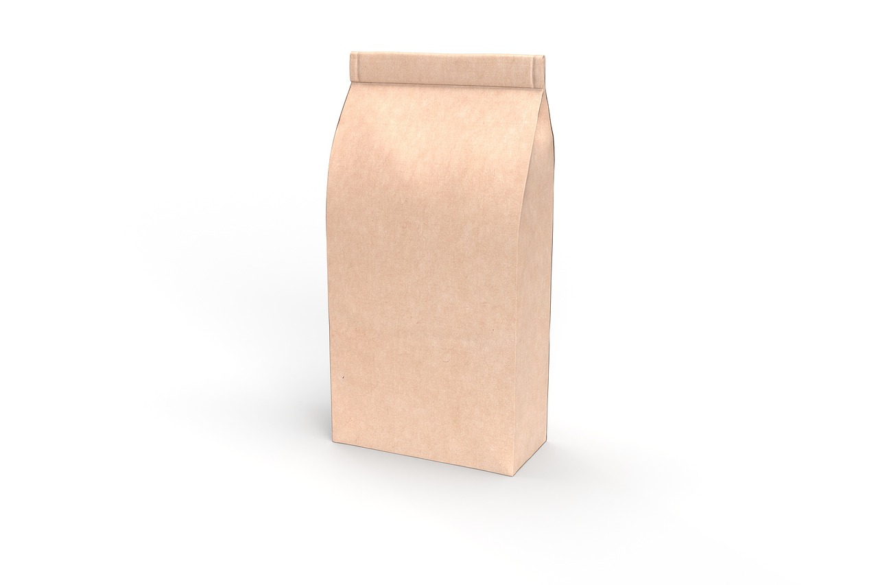 Brązowa papierowa torba z zamknięciem, symbolizująca składniki kawy zbożowej.