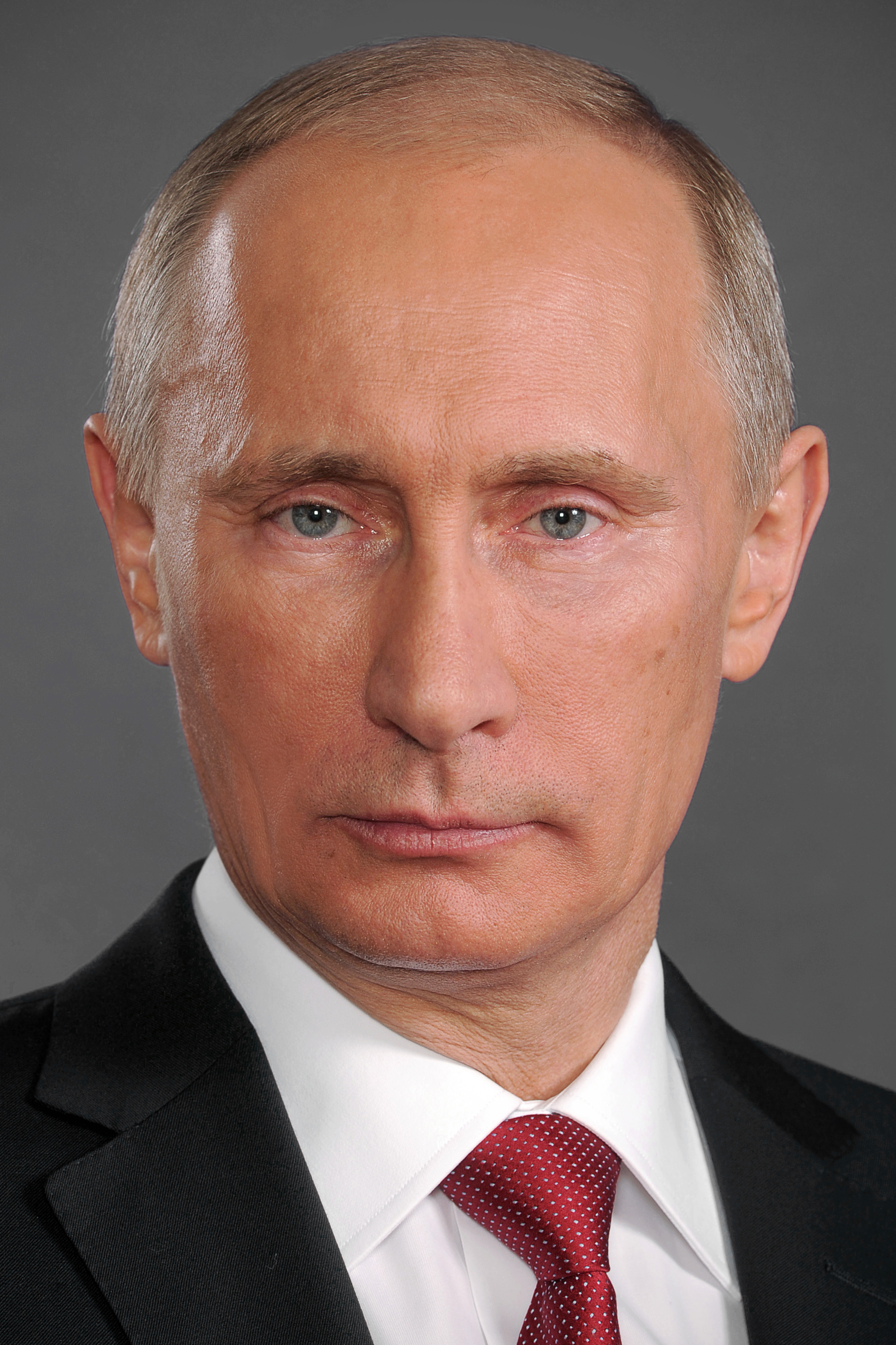 Portret Władimira Putina, kluczowej postaci w analizie wpływu decyzji Kremla na gospodarkę.