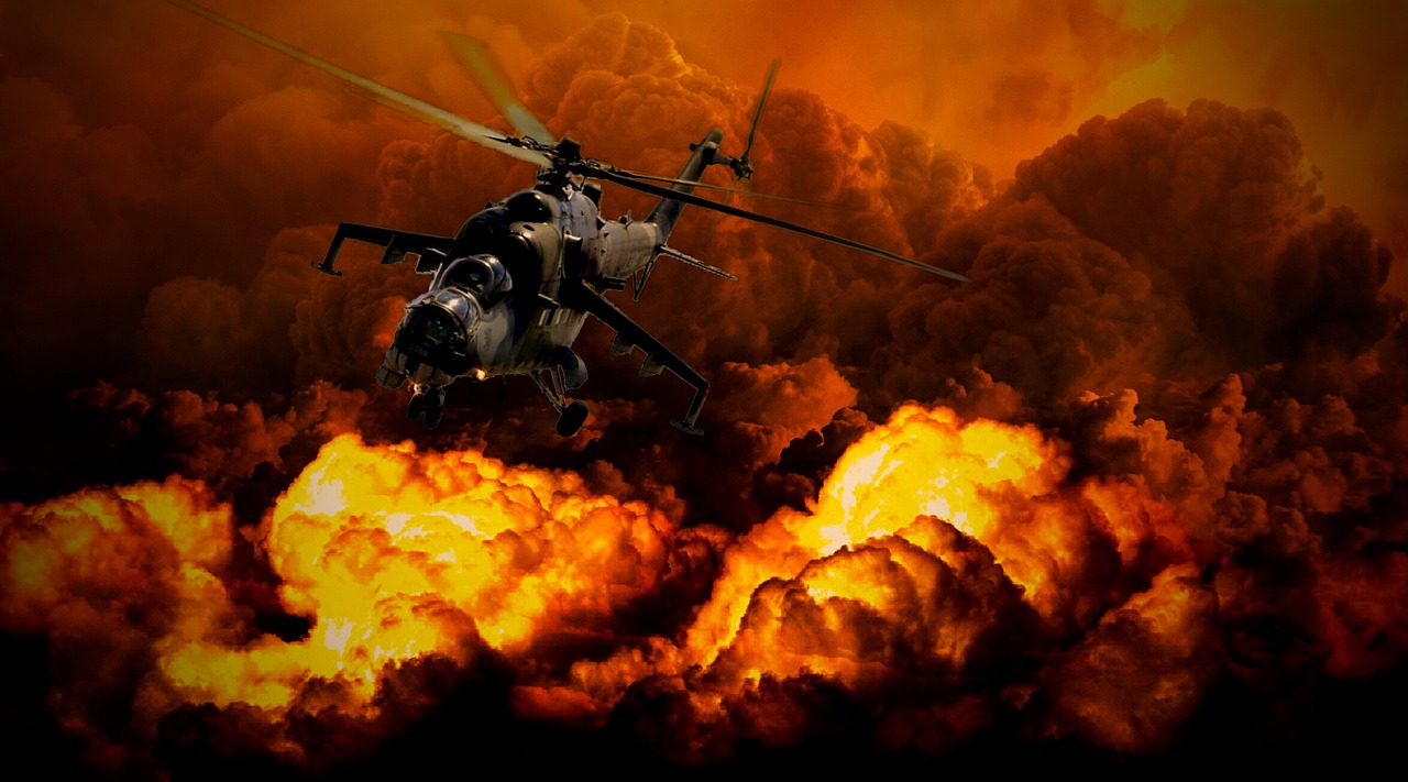Atak na rosyjskie zaplecze wojskowe: helikopter bojowy na tle eksplozji i dymu.