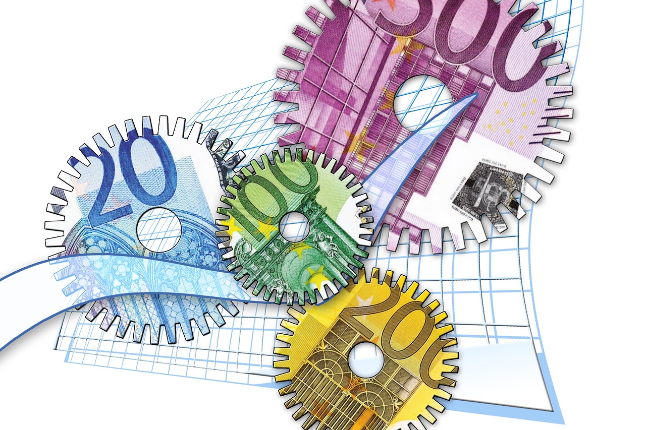 Koła zębate z banknotami euro symbolizujące siłę gospodarczą Polski w kontekście G20.