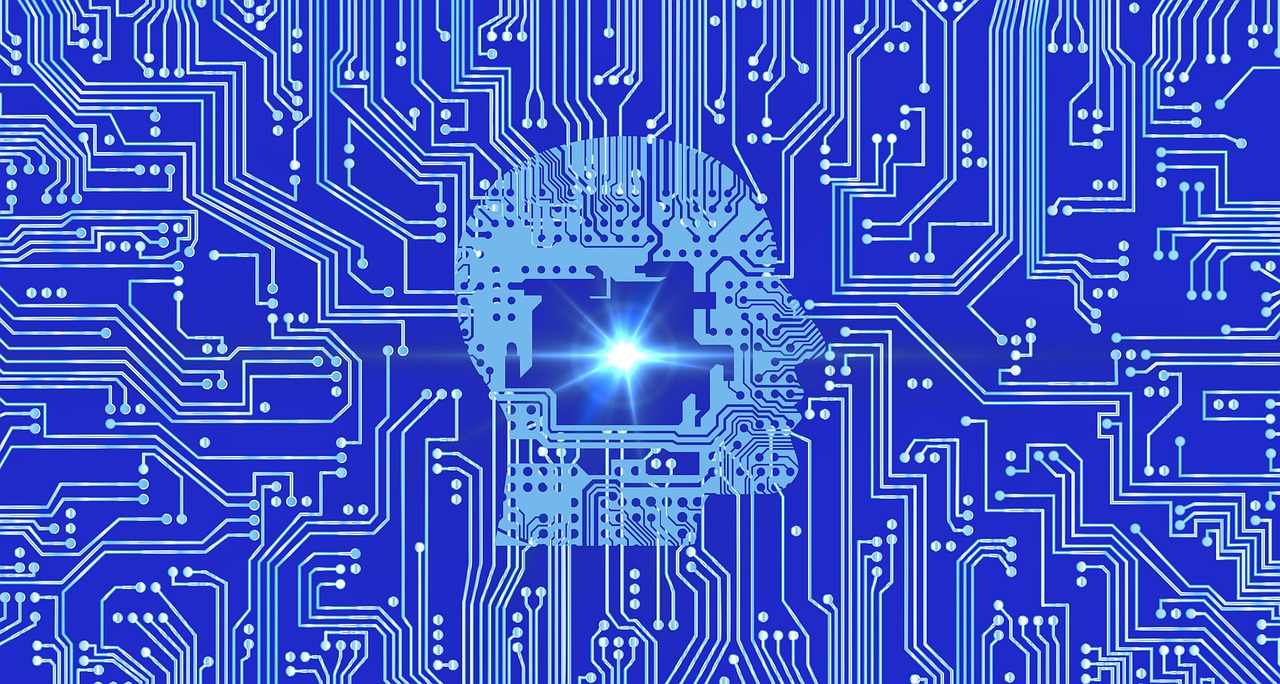 AI i telekomunikacja: Obraz głowy wypełnionej obwodami, symbolizujący sztuczną inteligencję w MWC 2026.